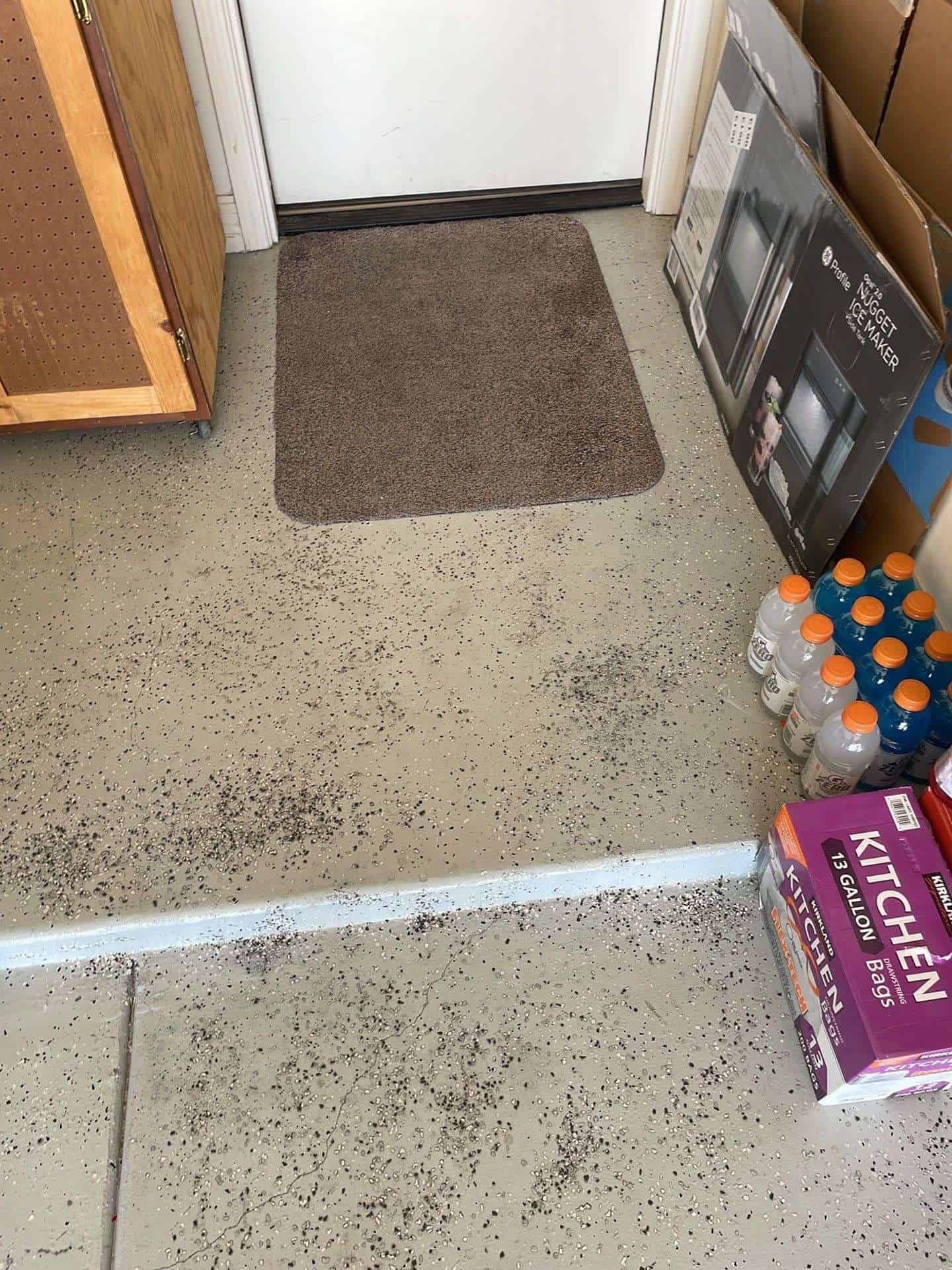 Garage floor that had epoxy coating on it